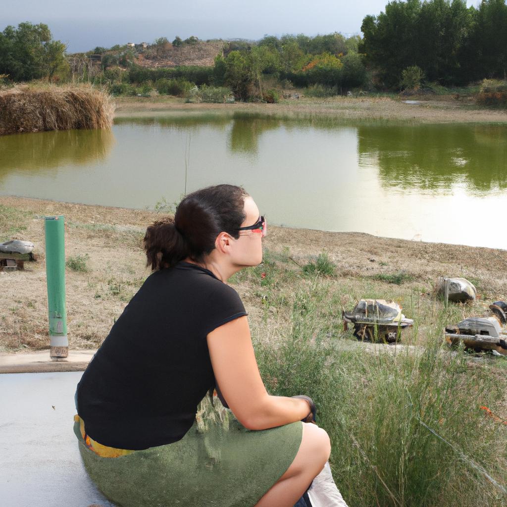 Woman observing turtles in habitat